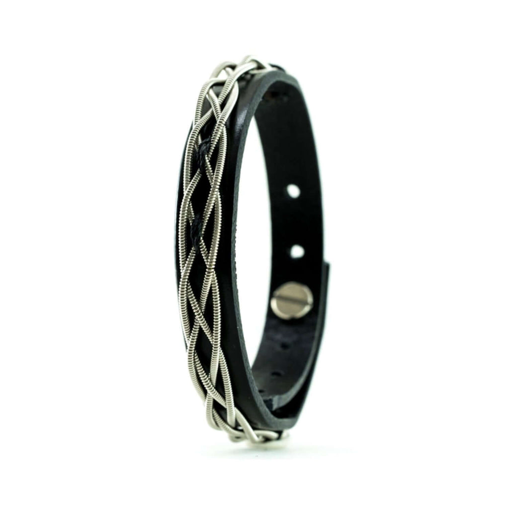 Urban Celtic electric guitar string bracelet standing on white background 