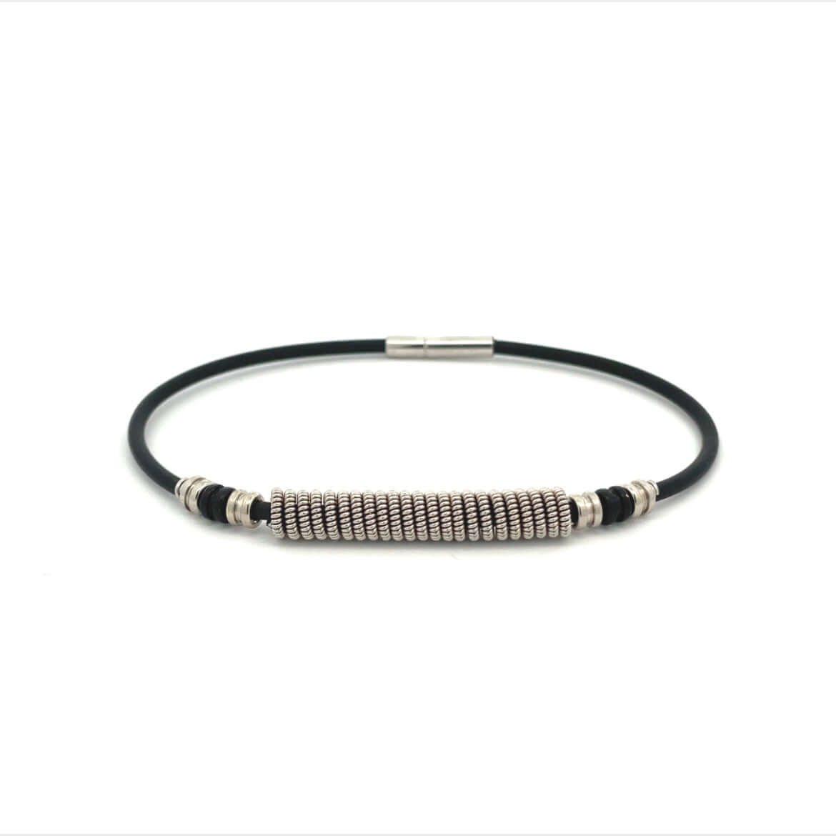 Black electric guitar string bracelet with silver and black accents on white background