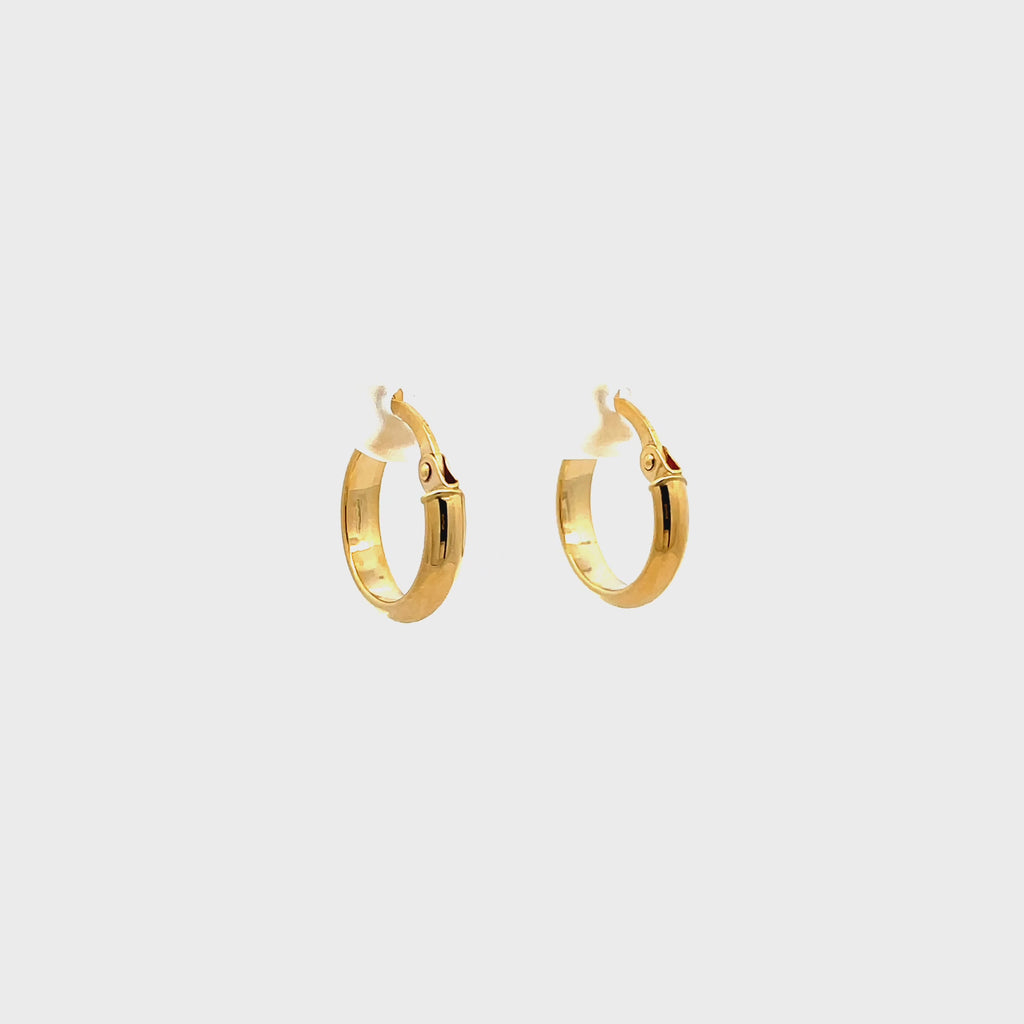 video of small gold hoop earrings rotating 