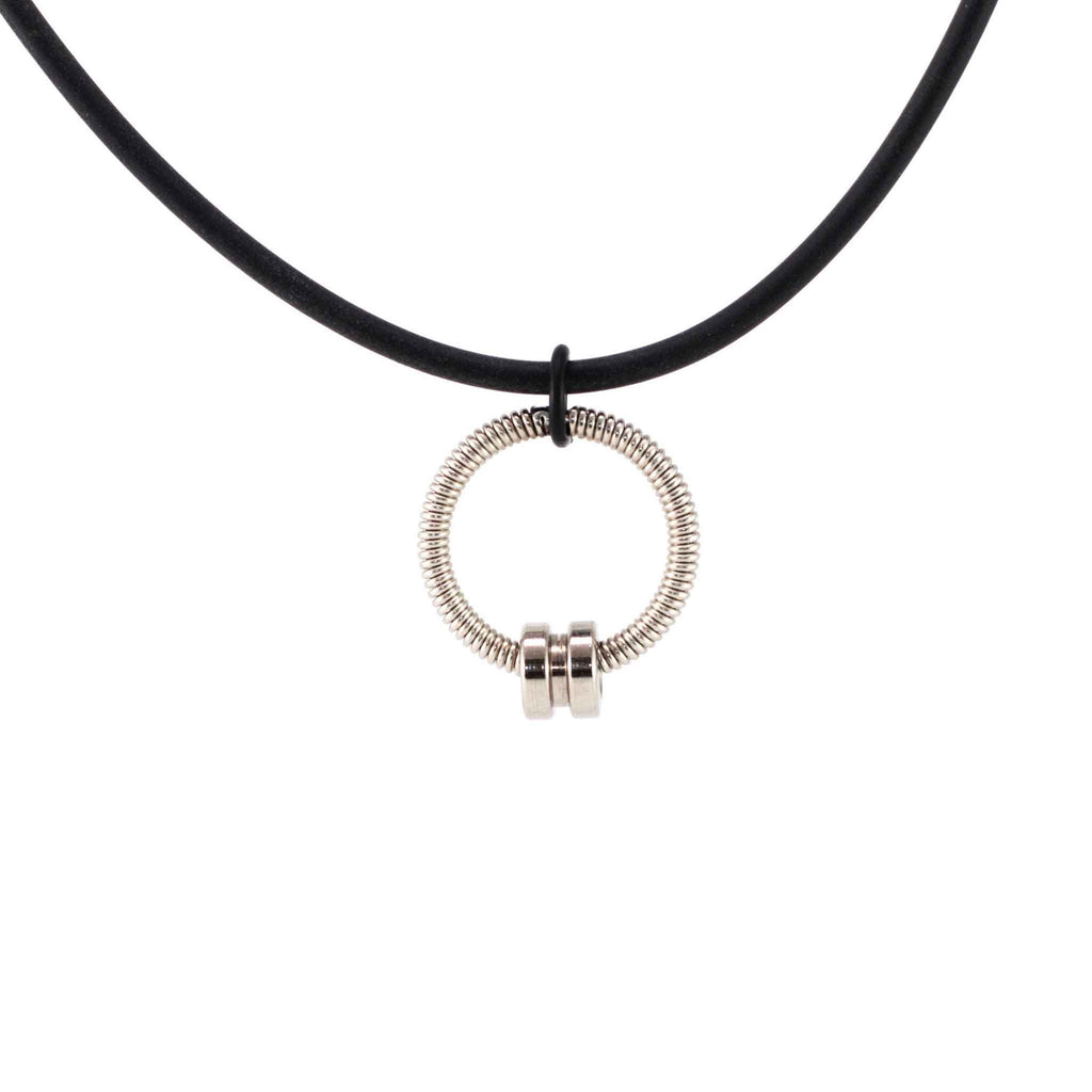 bass guitar string necklace with silver ball end and black lacing on white background