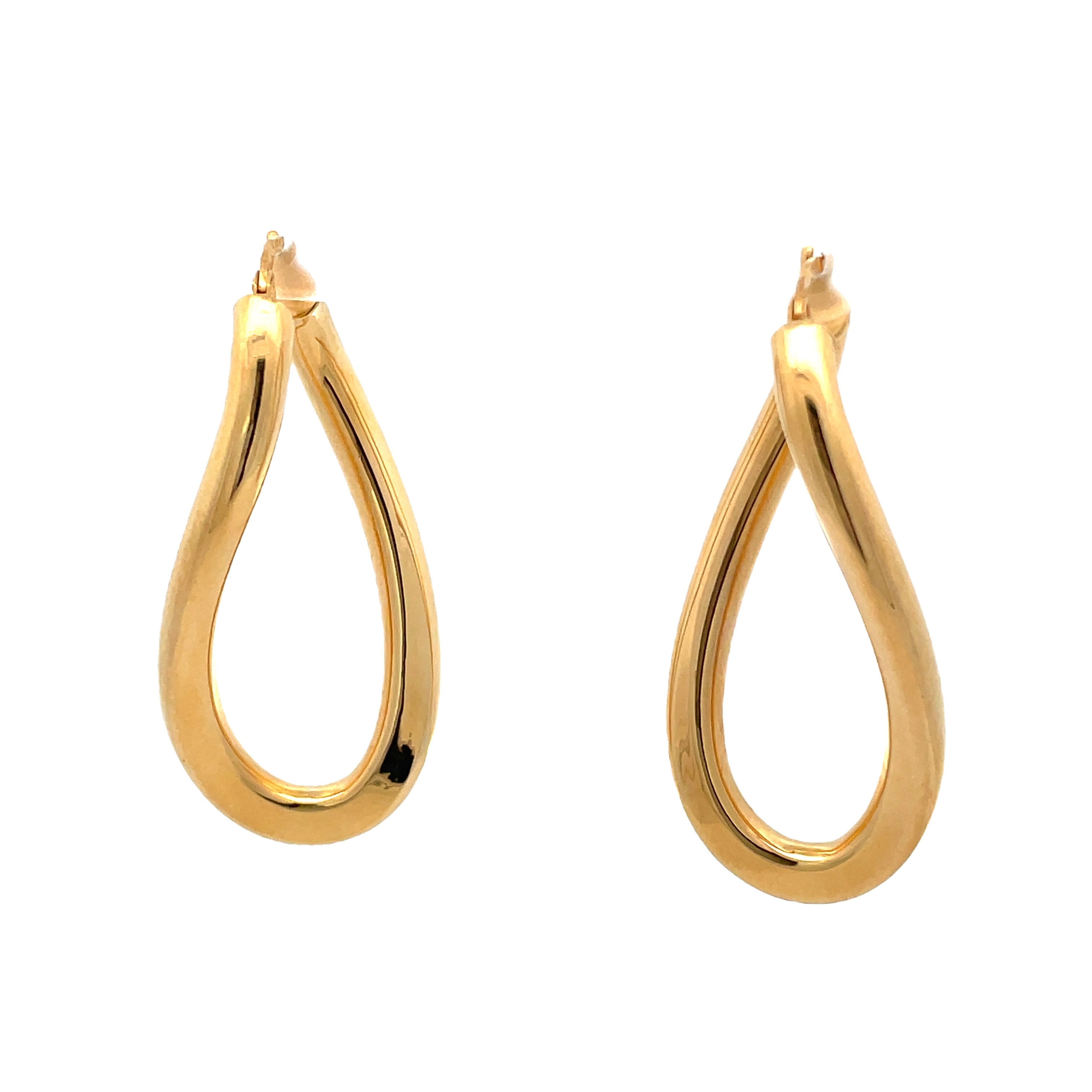 Gold hoop earrings on a white background