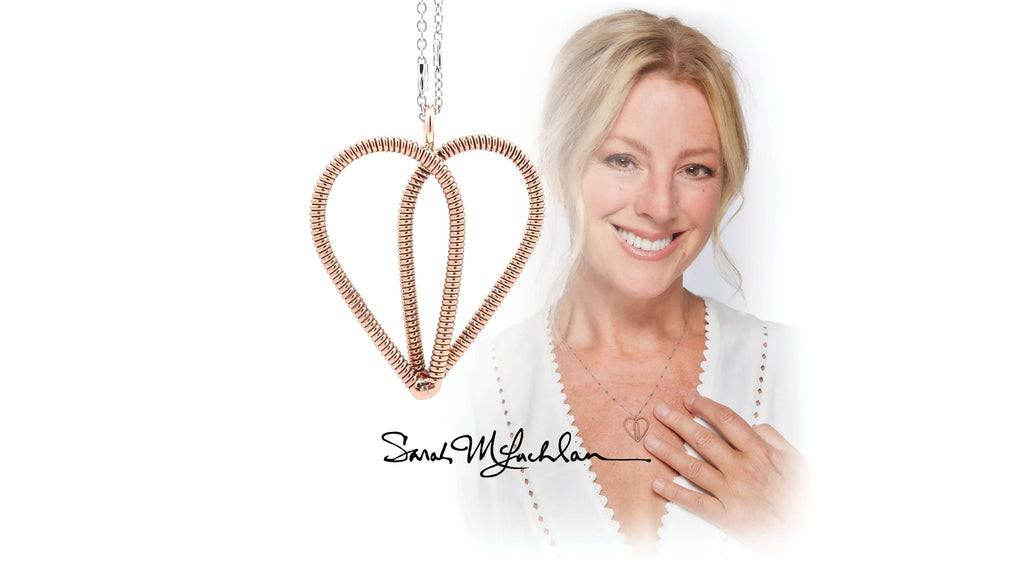 Sarah McLachlan with a heart necklace made from her guitar strings