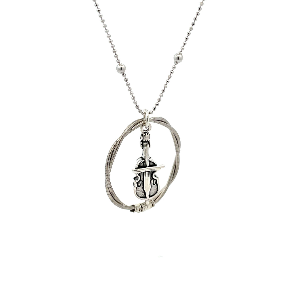 Cello string necklace on white background side view