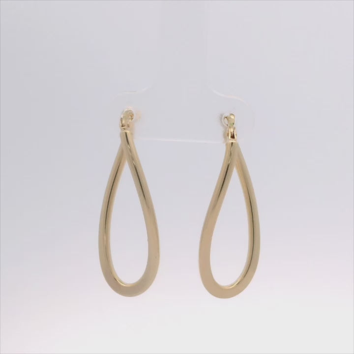 curved hoop earrings on whir background