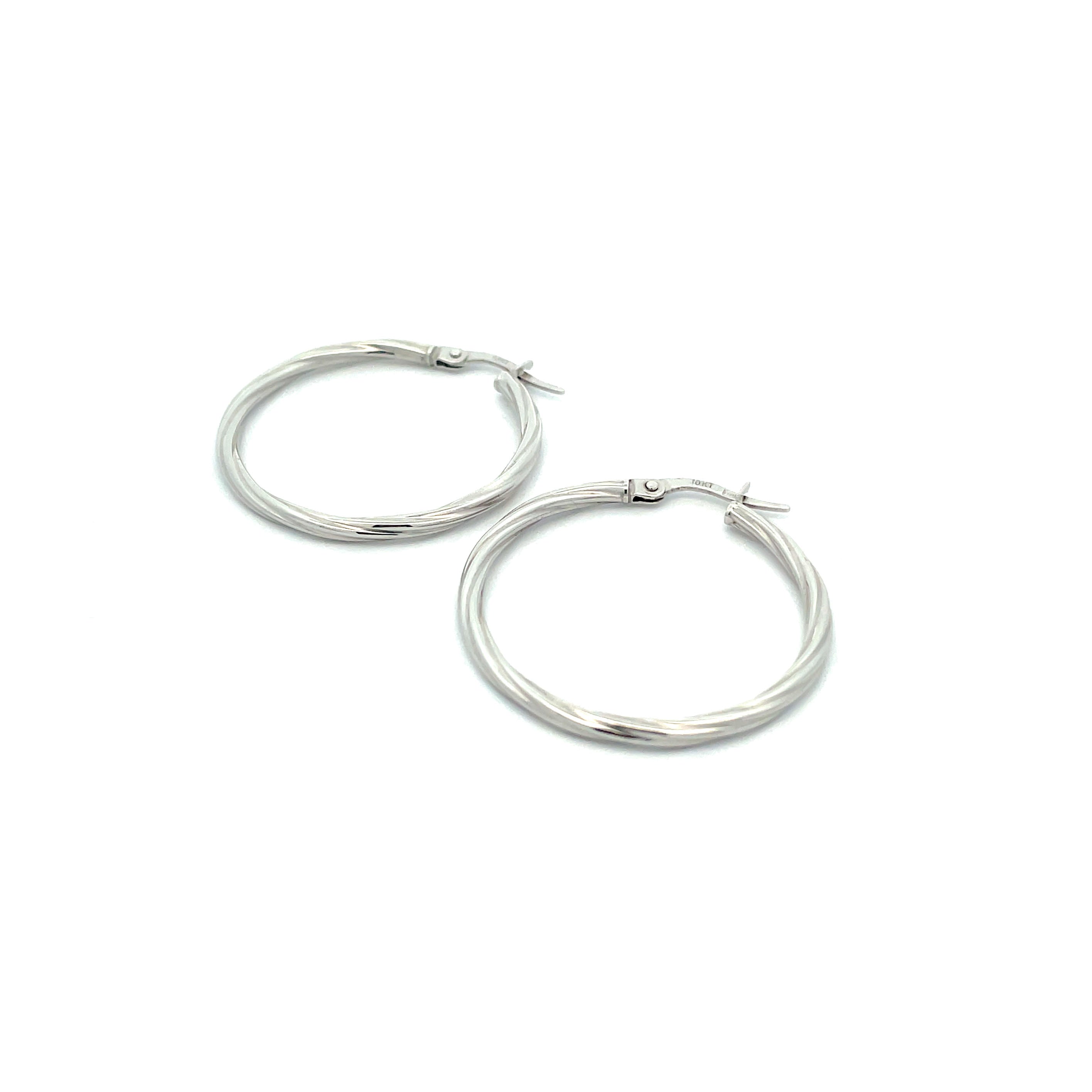 medium white gold twist hoop earrings on white background