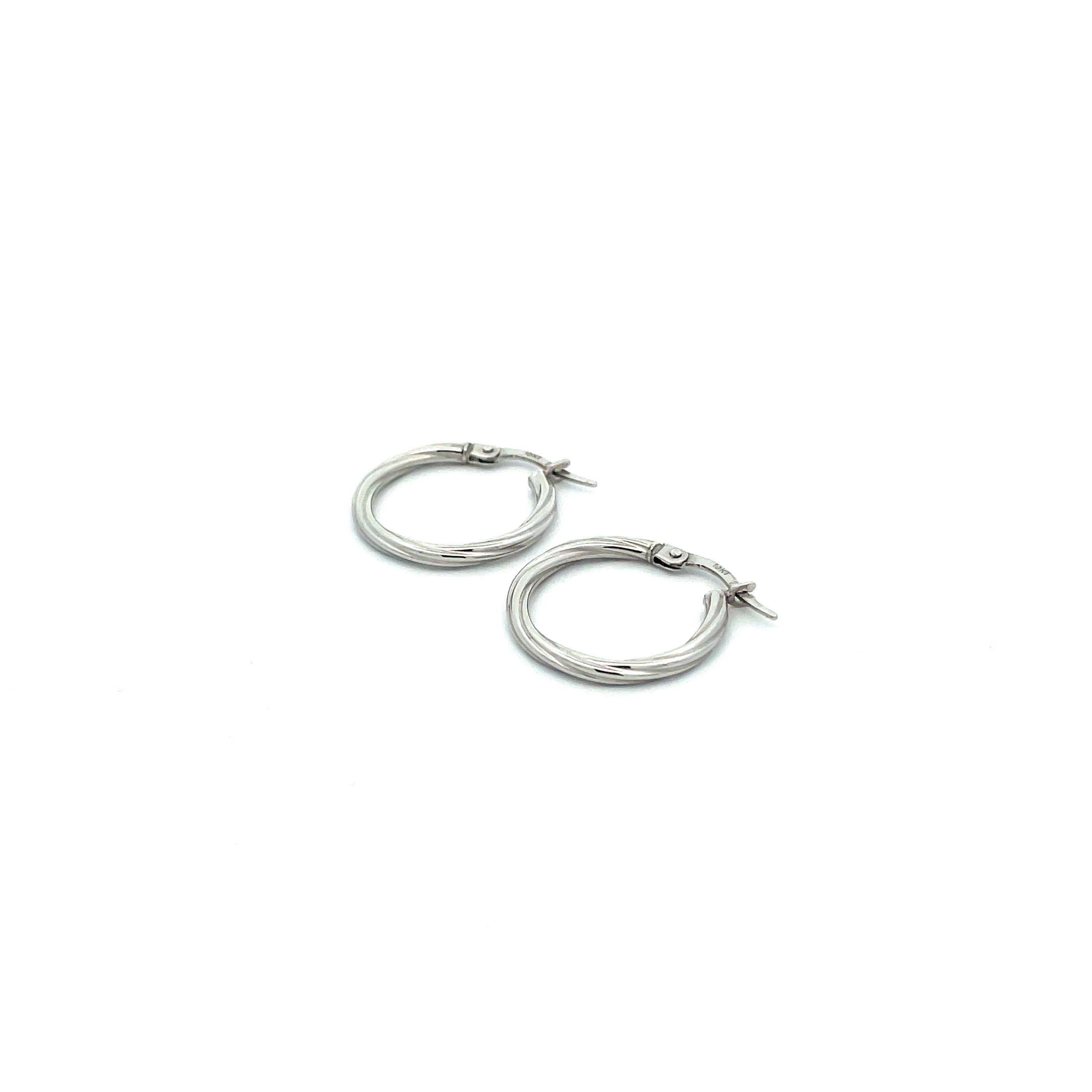 small white gold twist hoop earrings on white background