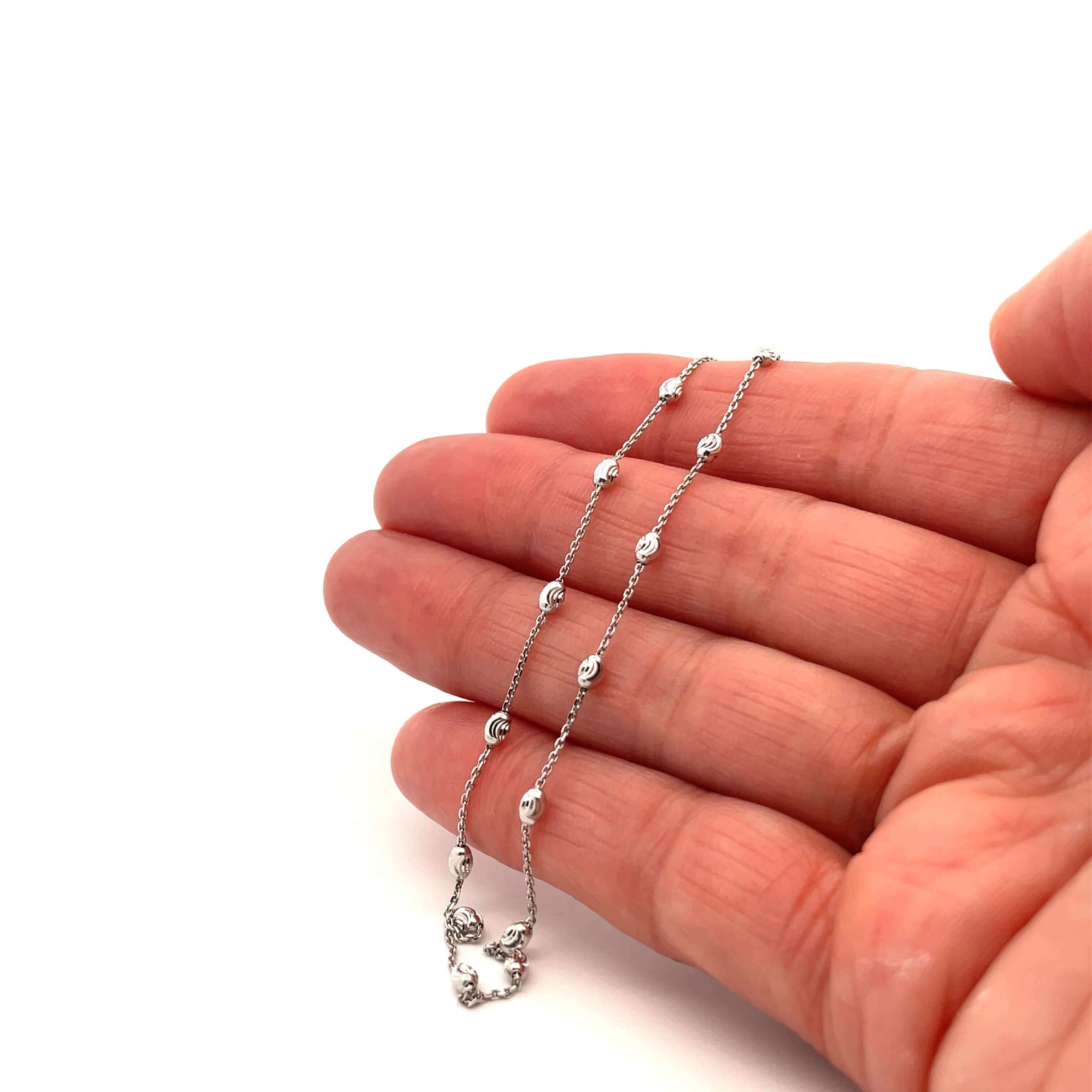 14k white gold moon cut chain on hand