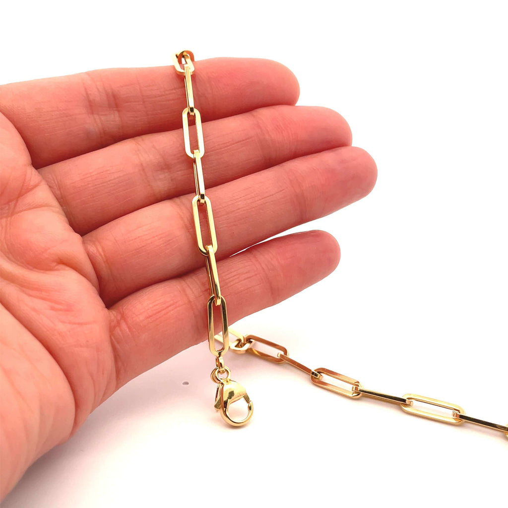 Large Brazen 14k gold paperclip chain on hand 