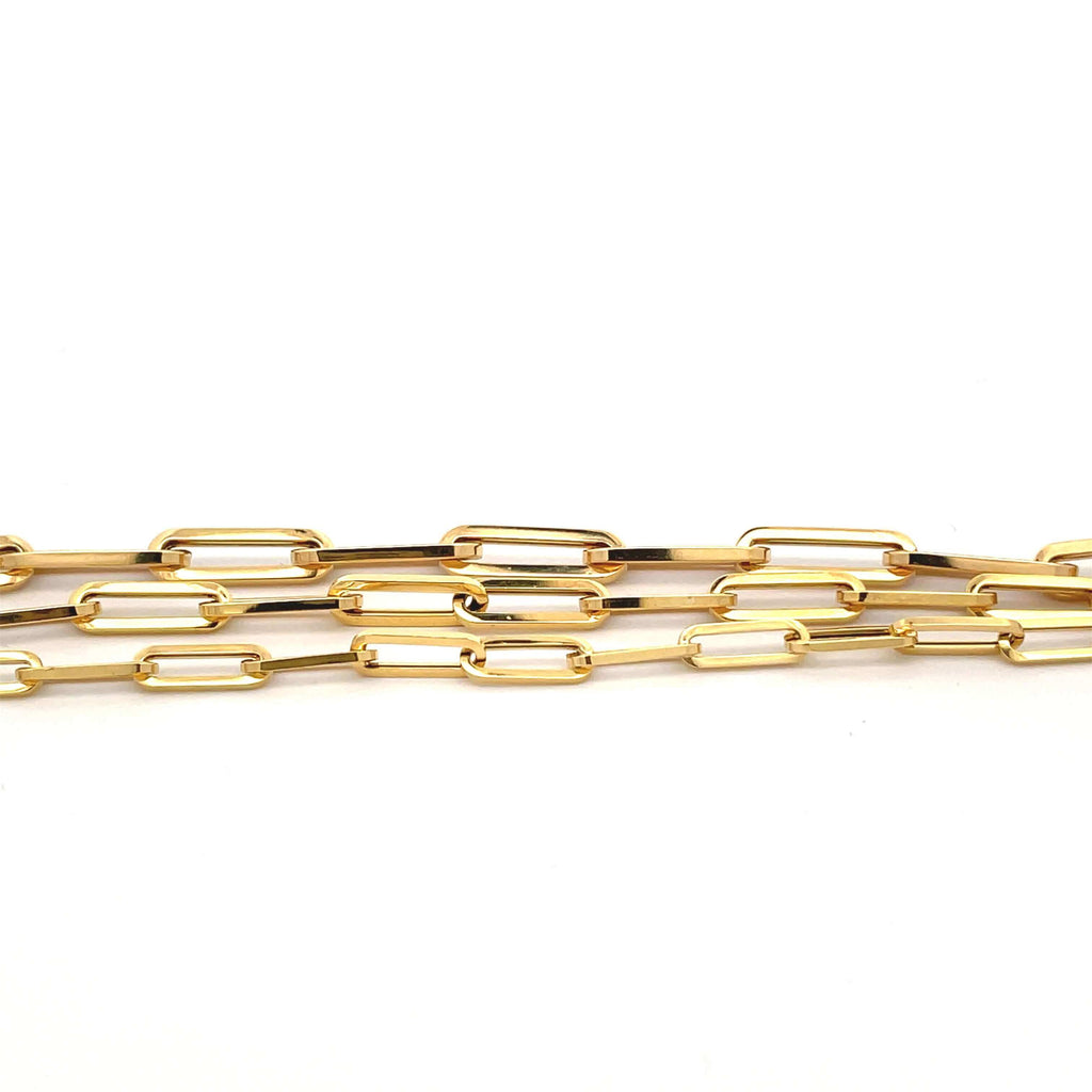 3, 14k gold paperclip chains on a white background