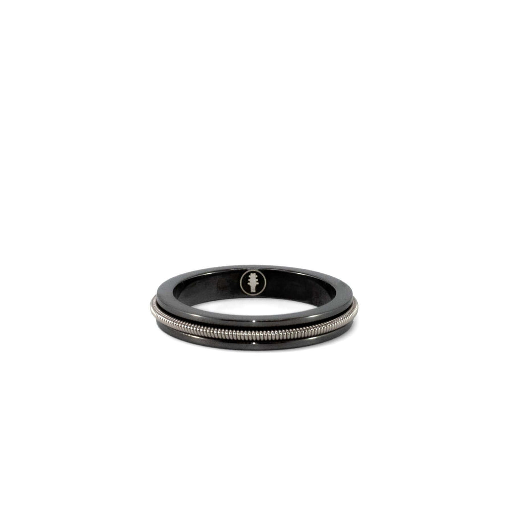 Electric guitar string black ring on a white background