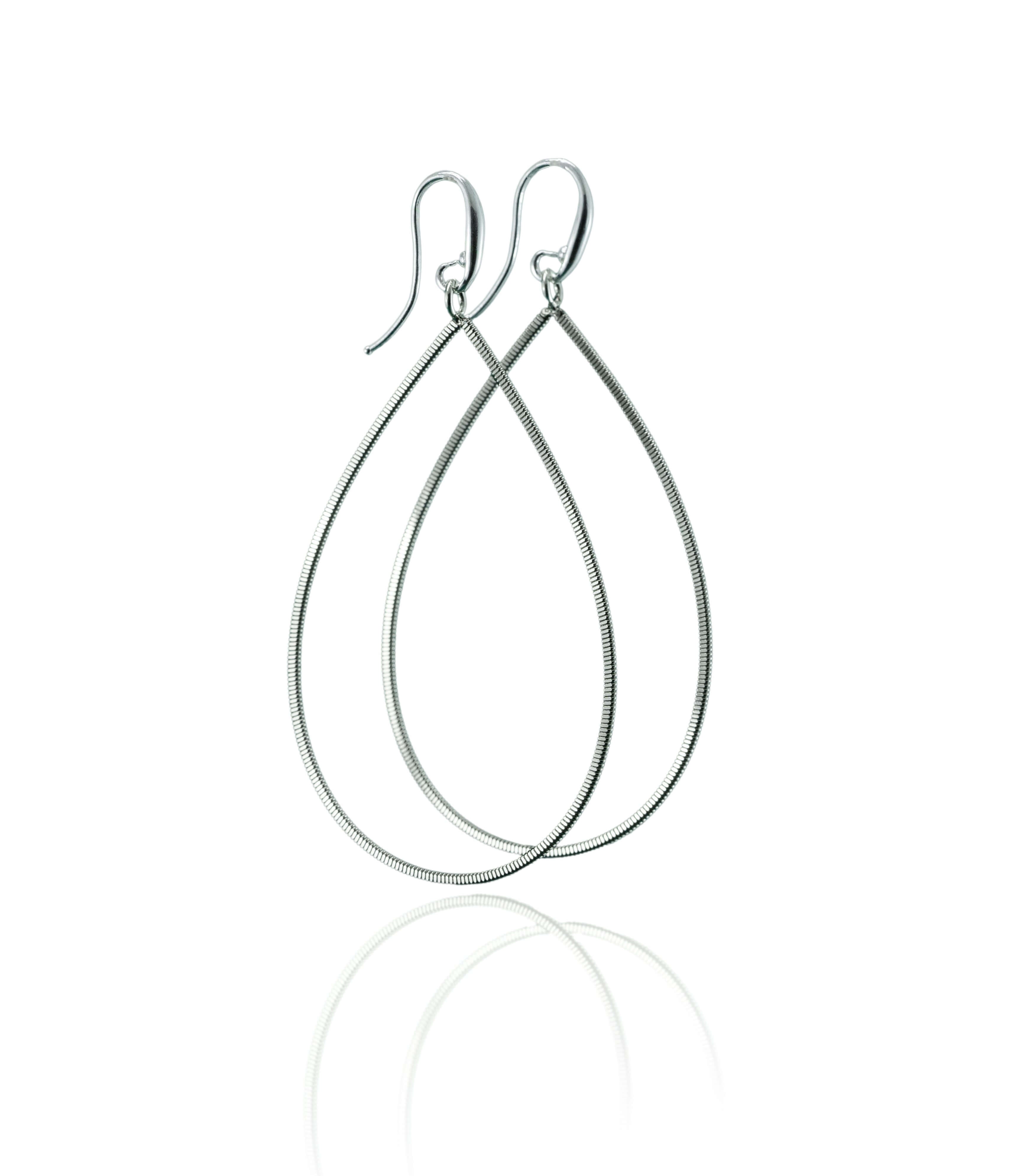 Electric guitar string tear drop earrings on a white background