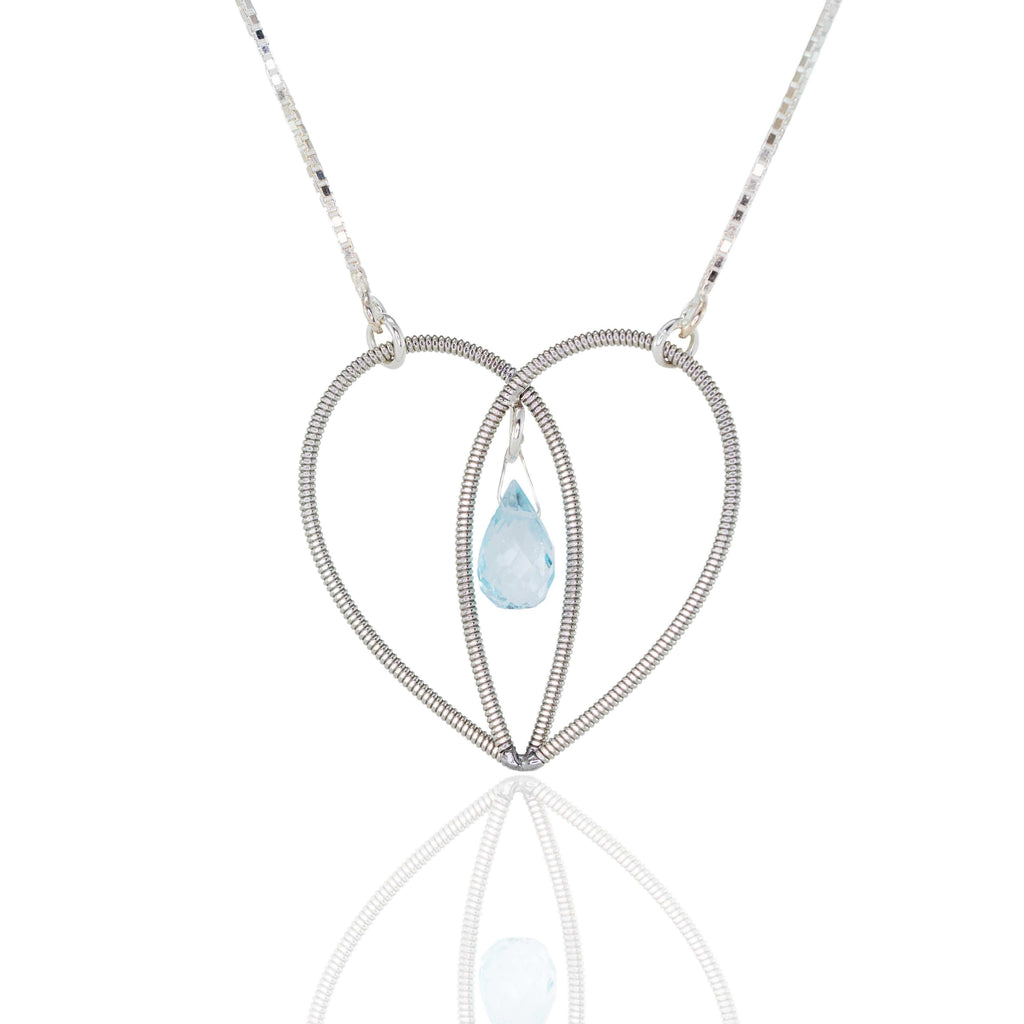 Electric guitar sting heart with aquamarine gemstone hanging on white background