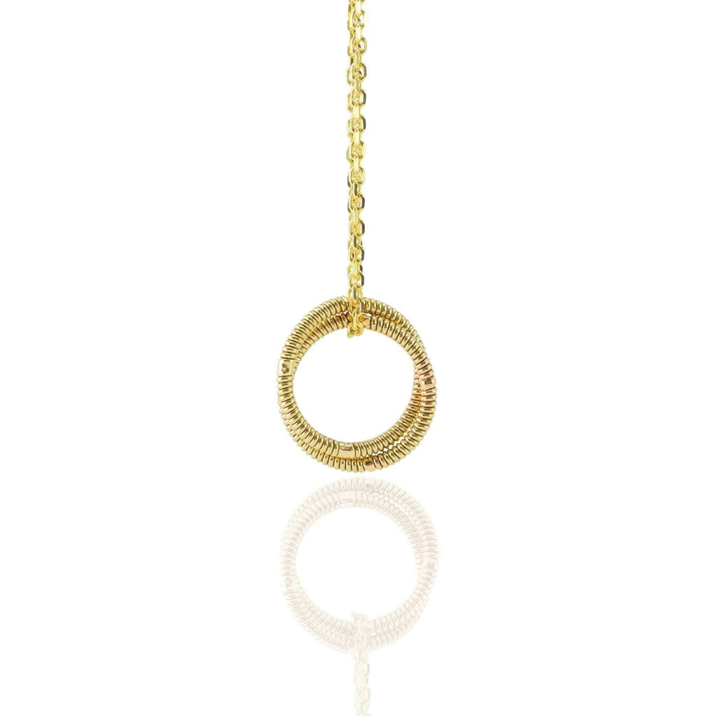 electric guitar string round pendant on 10K gold chain hanging on a white background