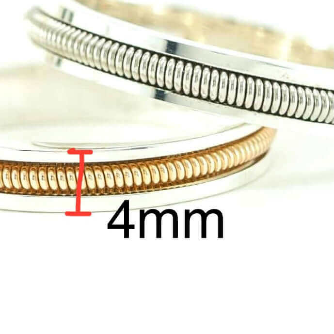 silver and guitar string rings on a white background with 4 mm width measurement